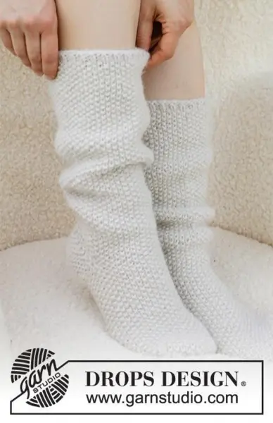 234-73 Snow White Socks by DROPS Design