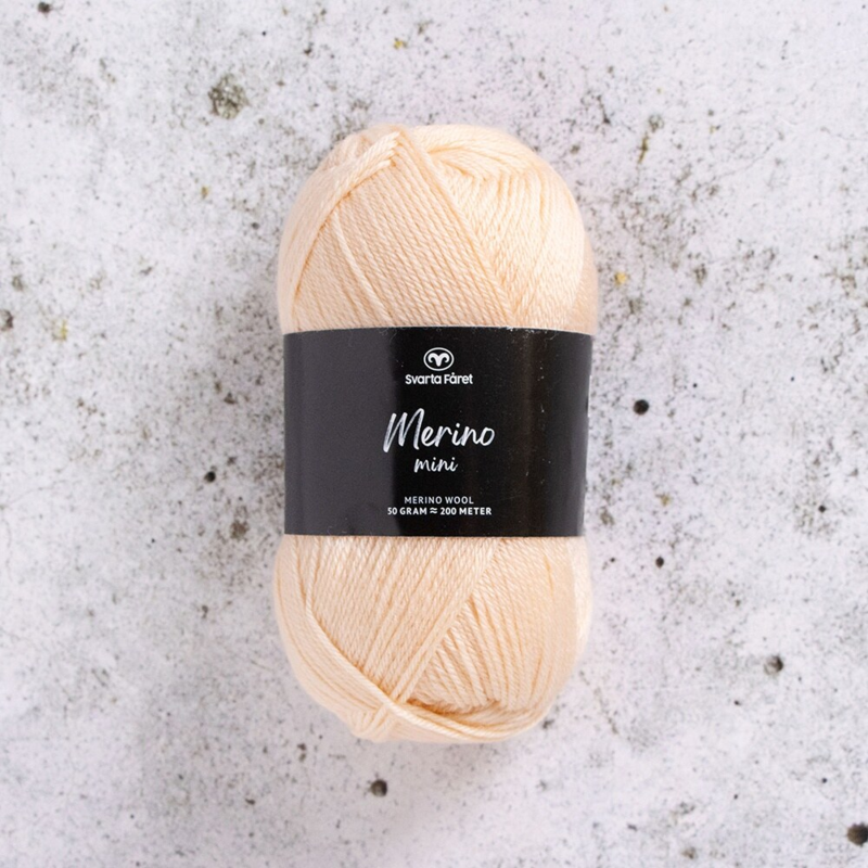 Svarta Fåret Merino Mini 07 Macadamianød